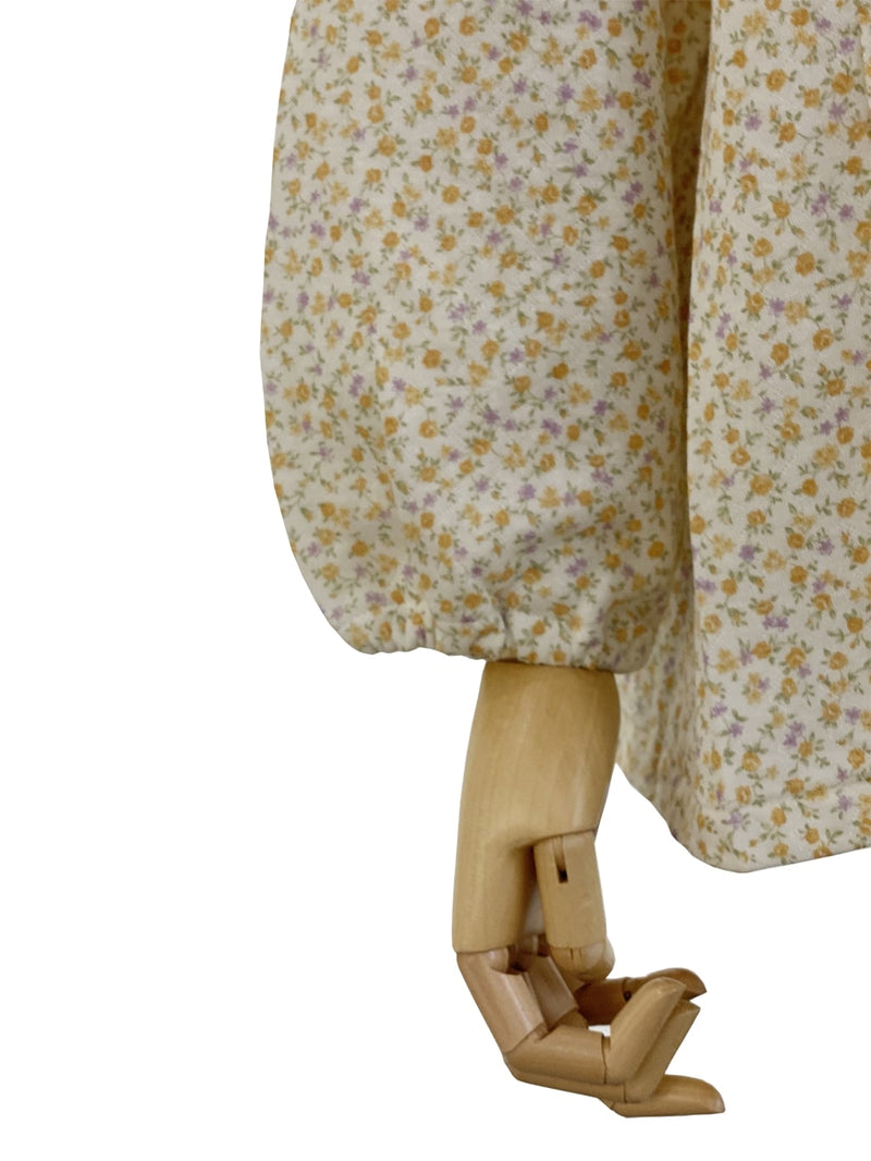 日本gunze-秋冬女裝大鈕扣睡衣套裝-黃色花  鈕扣採用彩色魔術貼設計，容易穿脫。適合秋冬穿著，時尚花紋，美觀大方，前方有袋子，方便放置小物 腰部具有鬆緊帶，可調節褲子開口鬆緊。